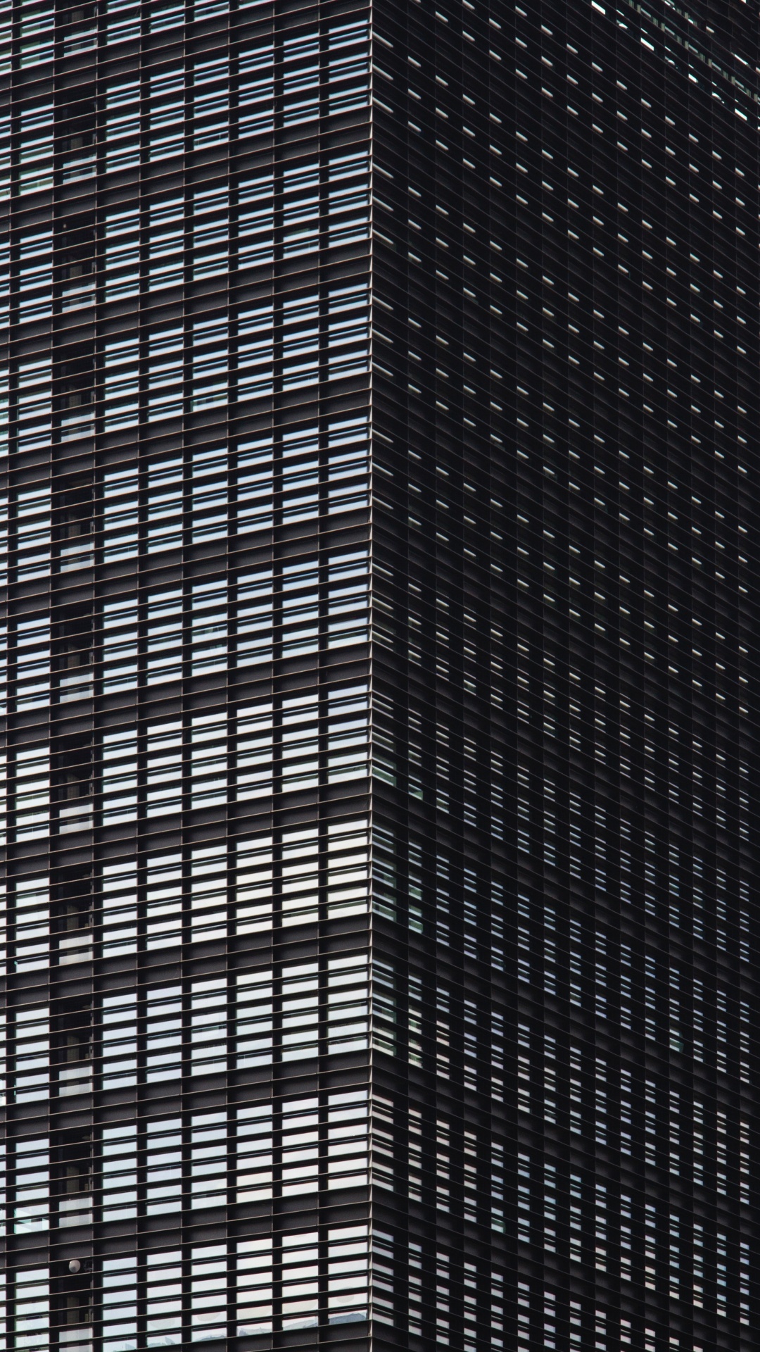 Braunes Und Schwarzes Hochhaus. Wallpaper in 1080x1920 Resolution