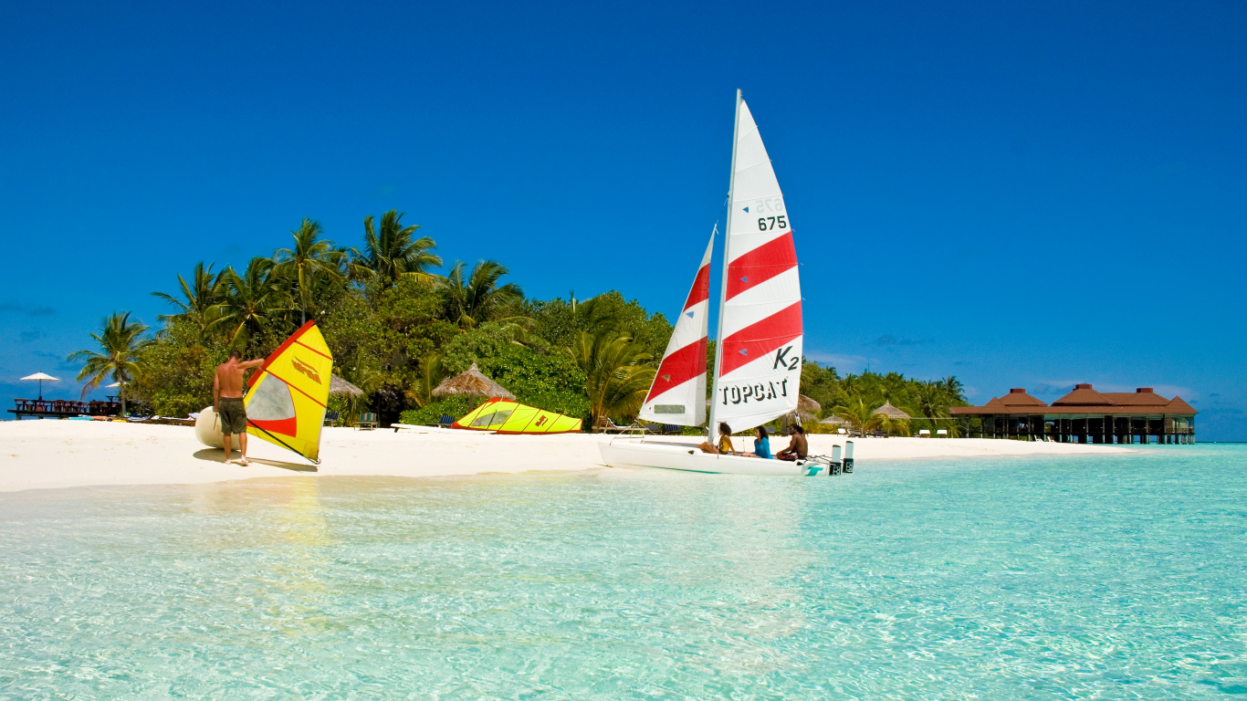 Red White and Blue Sail Boat on Sea Shore During Daytime. Wallpaper in 1366x768 Resolution