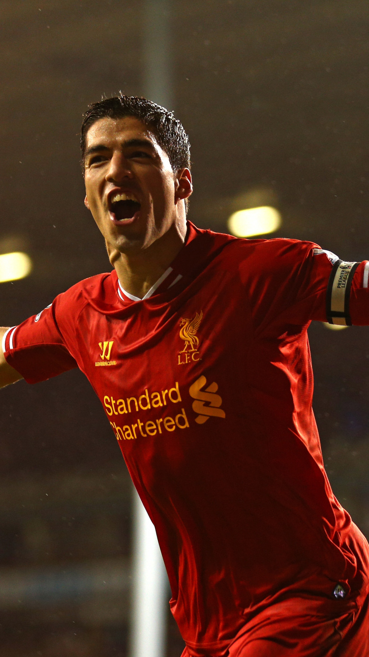 Man in Red Nike Soccer Jersey. Wallpaper in 750x1334 Resolution