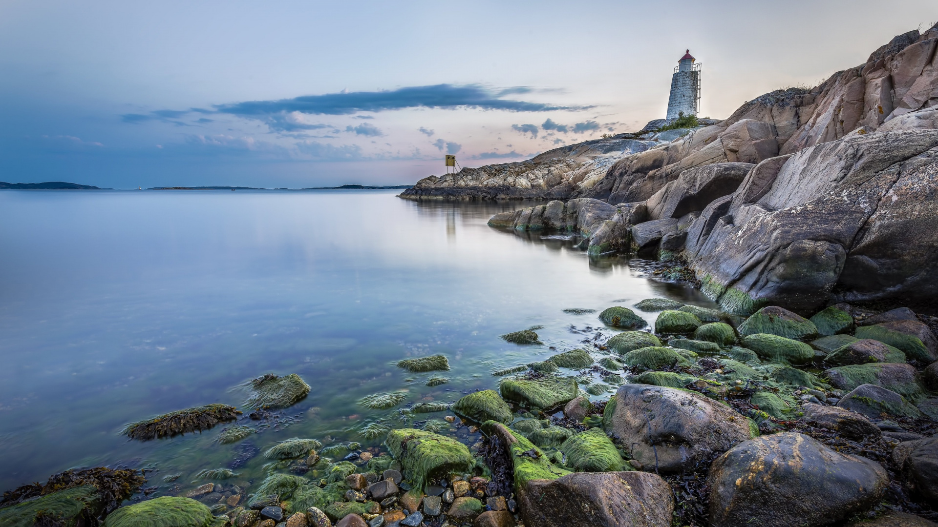 White Lighthouse on Rocky Shore During Daytime. Wallpaper in 1920x1080 Resolution