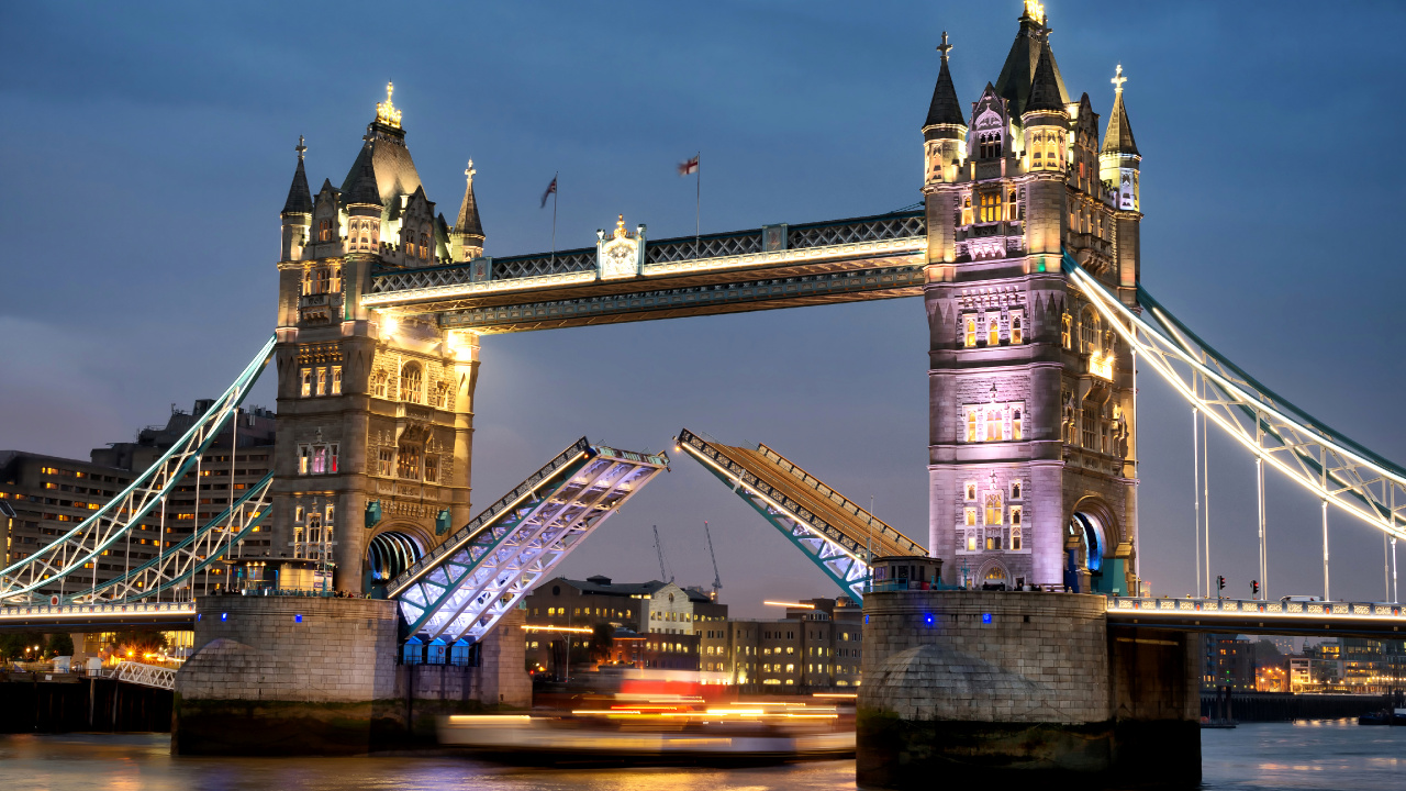 Brown Bridge Under Blue Sky During Night Time. Wallpaper in 1280x720 Resolution