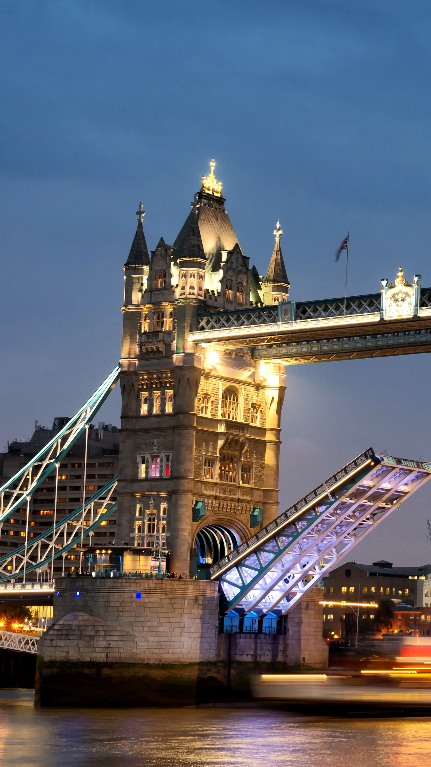 Brown Bridge Under Blue Sky During Night Time. Wallpaper in 1440x2560 Resolution