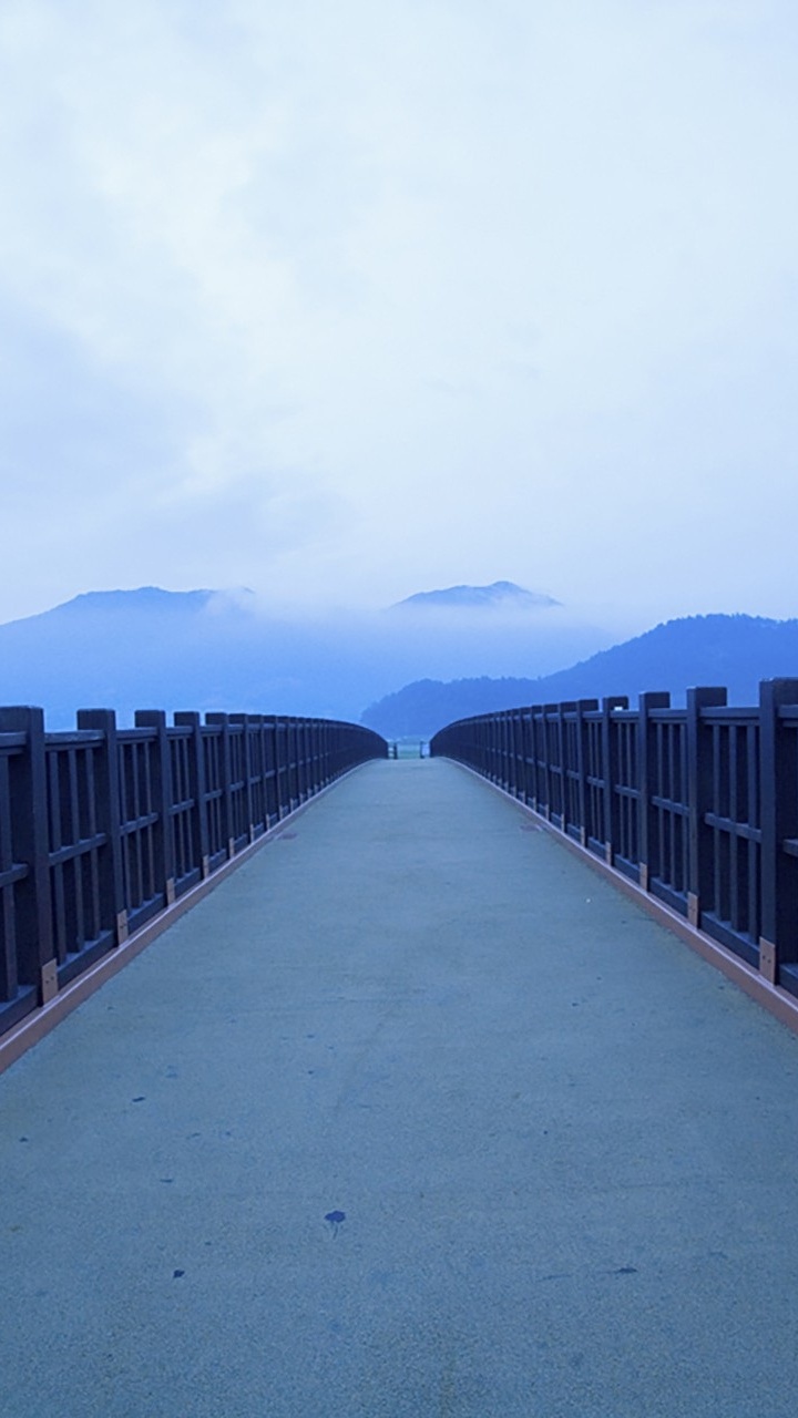 Gray Concrete Bridge Over The Sea During Daytime. Wallpaper in 720x1280 Resolution