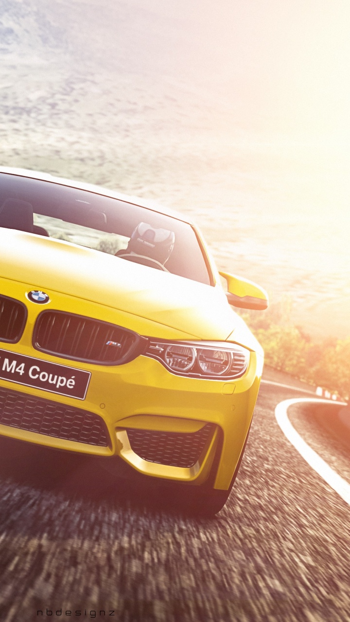 Bmw m 3 Amarillo en la Carretera Durante el Día. Wallpaper in 720x1280 Resolution