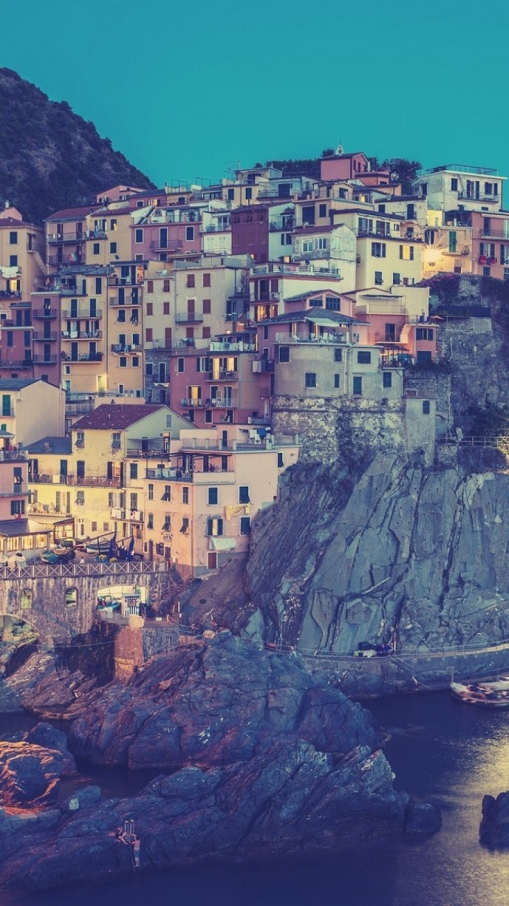 Houses on Cliff Near Body of Water During Daytime. Wallpaper in 720x1280 Resolution