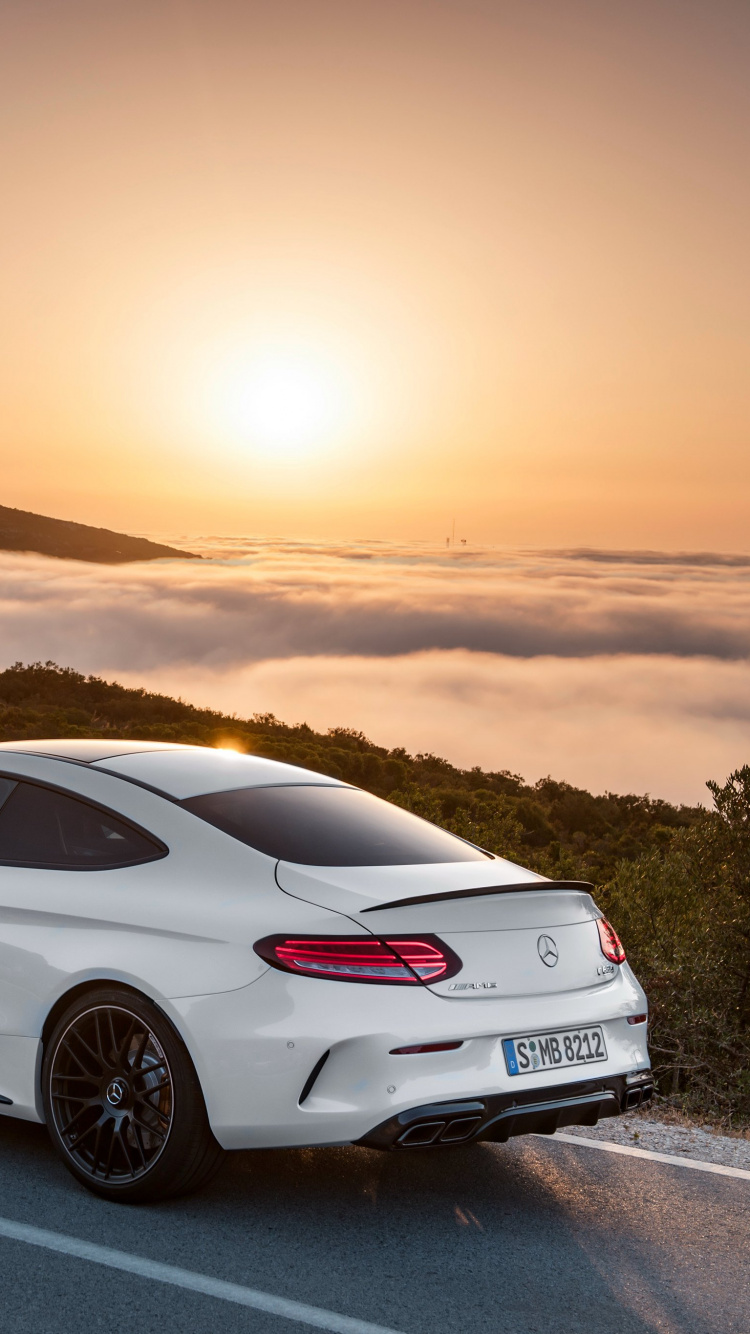 White Porsche 911 on Road During Daytime. Wallpaper in 750x1334 Resolution