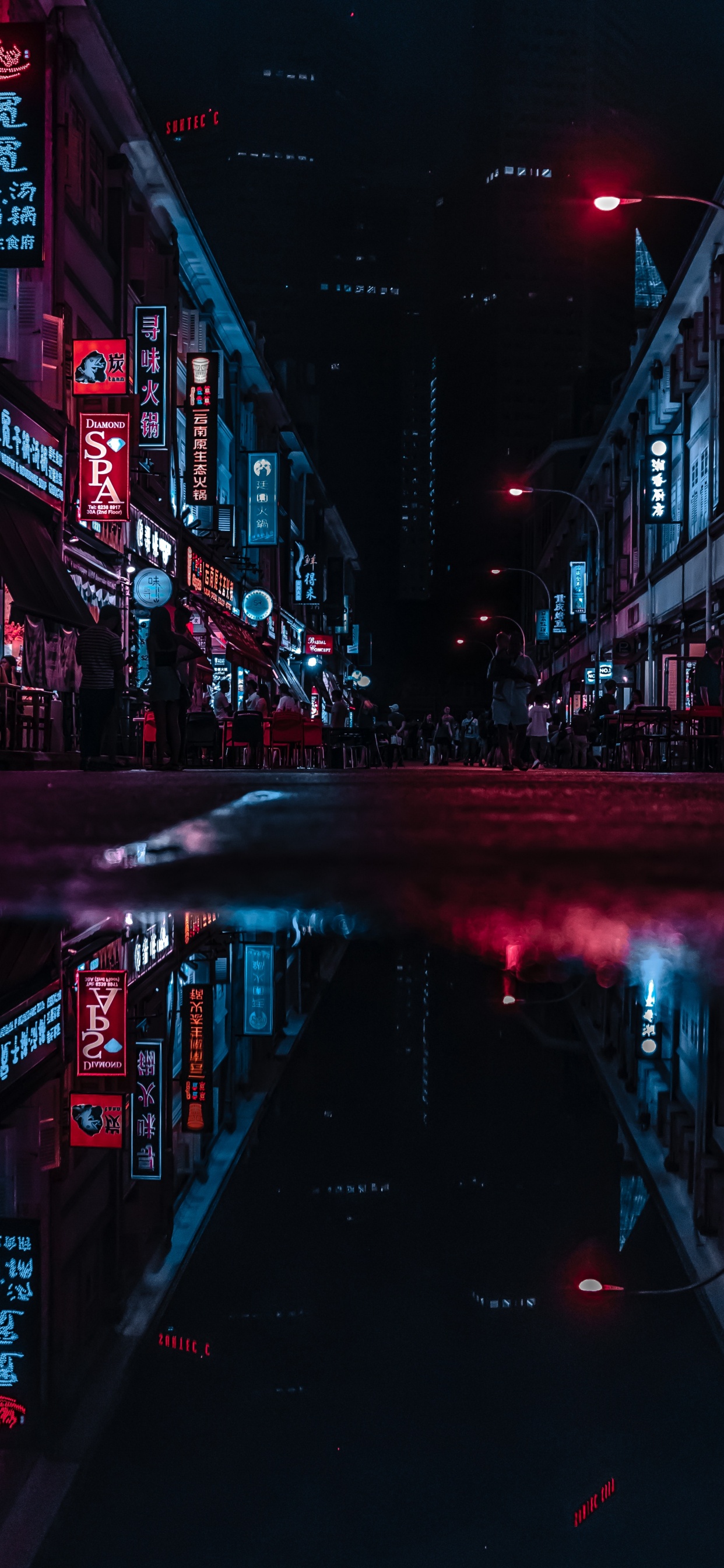 Red and Black Concrete Building During Night Time. Wallpaper in 1242x2688 Resolution