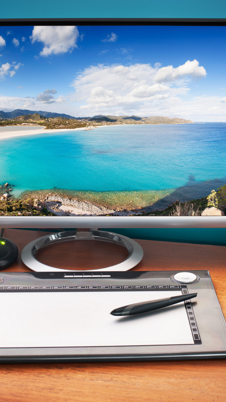 Macbook Pro on Brown Wooden Table. Wallpaper in 750x1334 Resolution