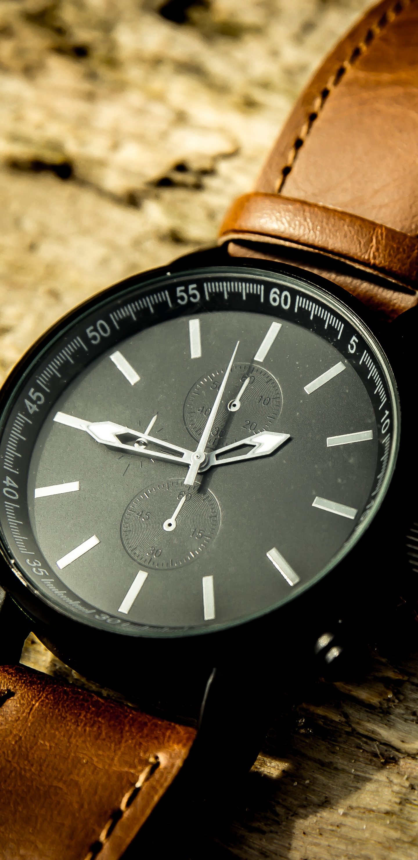 Brown Leather Strap Blue Round Analog Watch. Wallpaper in 1440x2960 Resolution