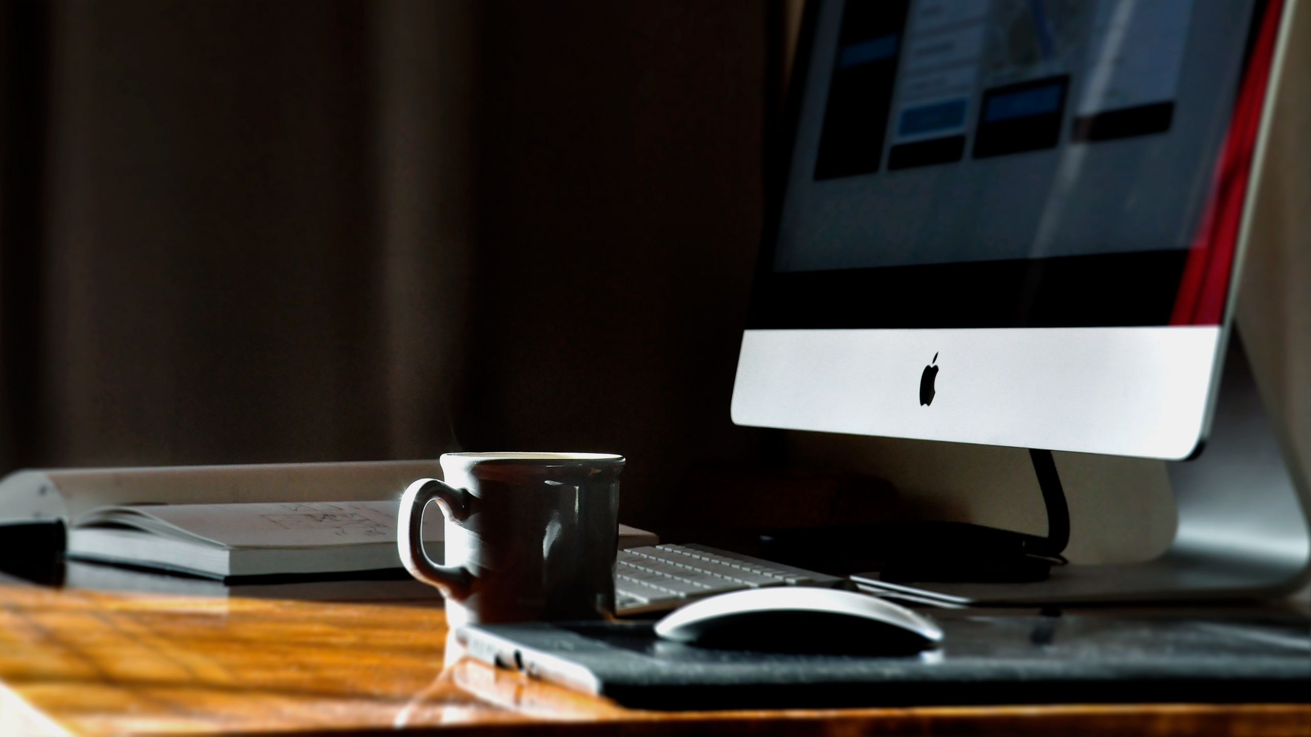 White Ceramic Mug on White Ceramic Saucer Beside Silver Imac. Wallpaper in 2560x1440 Resolution