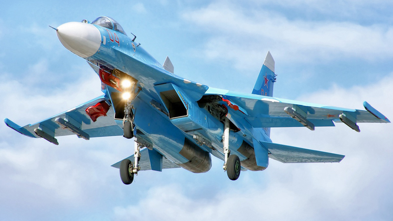 Blue and White Jet Plane in Mid Air During Daytime. Wallpaper in 1366x768 Resolution