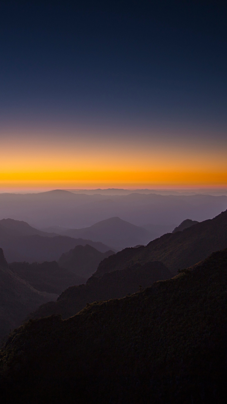 Silhouette of Mountains During Sunset. Wallpaper in 750x1334 Resolution