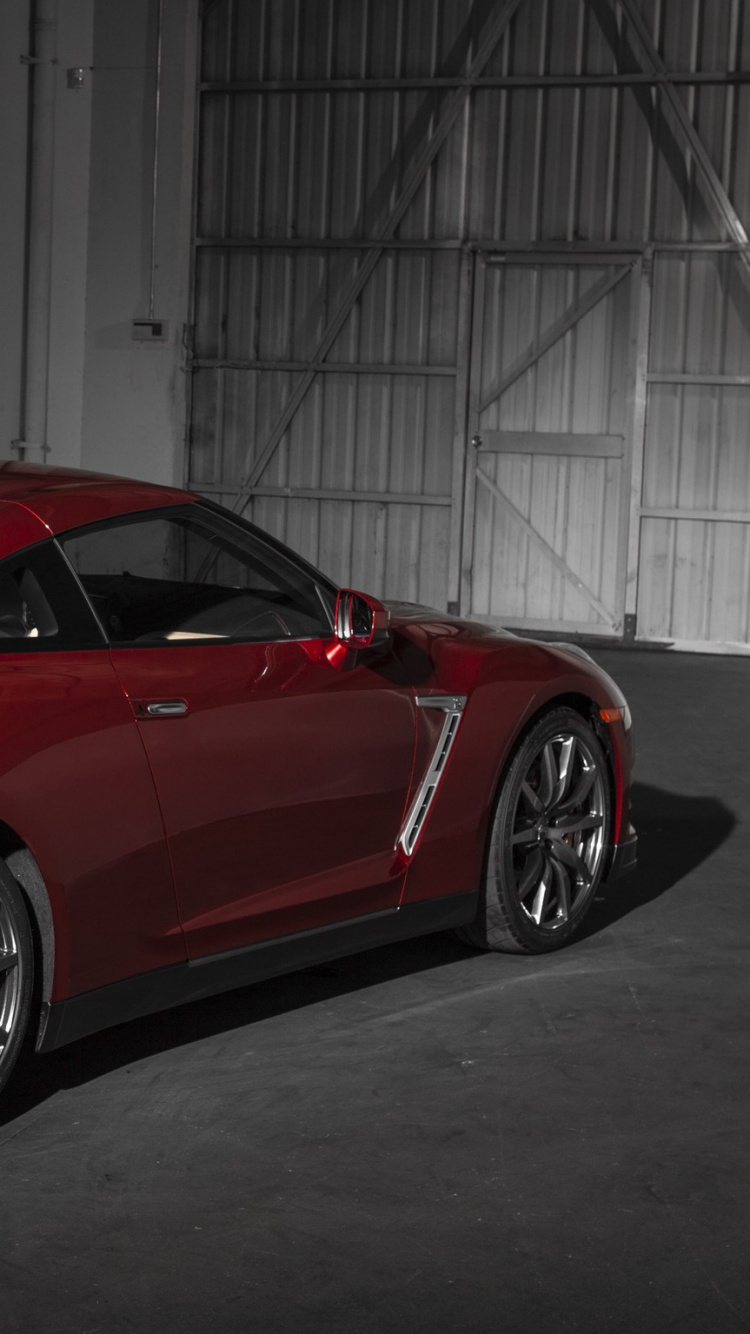 Red Ferrari 458 Italia Parked Inside Building. Wallpaper in 750x1334 Resolution