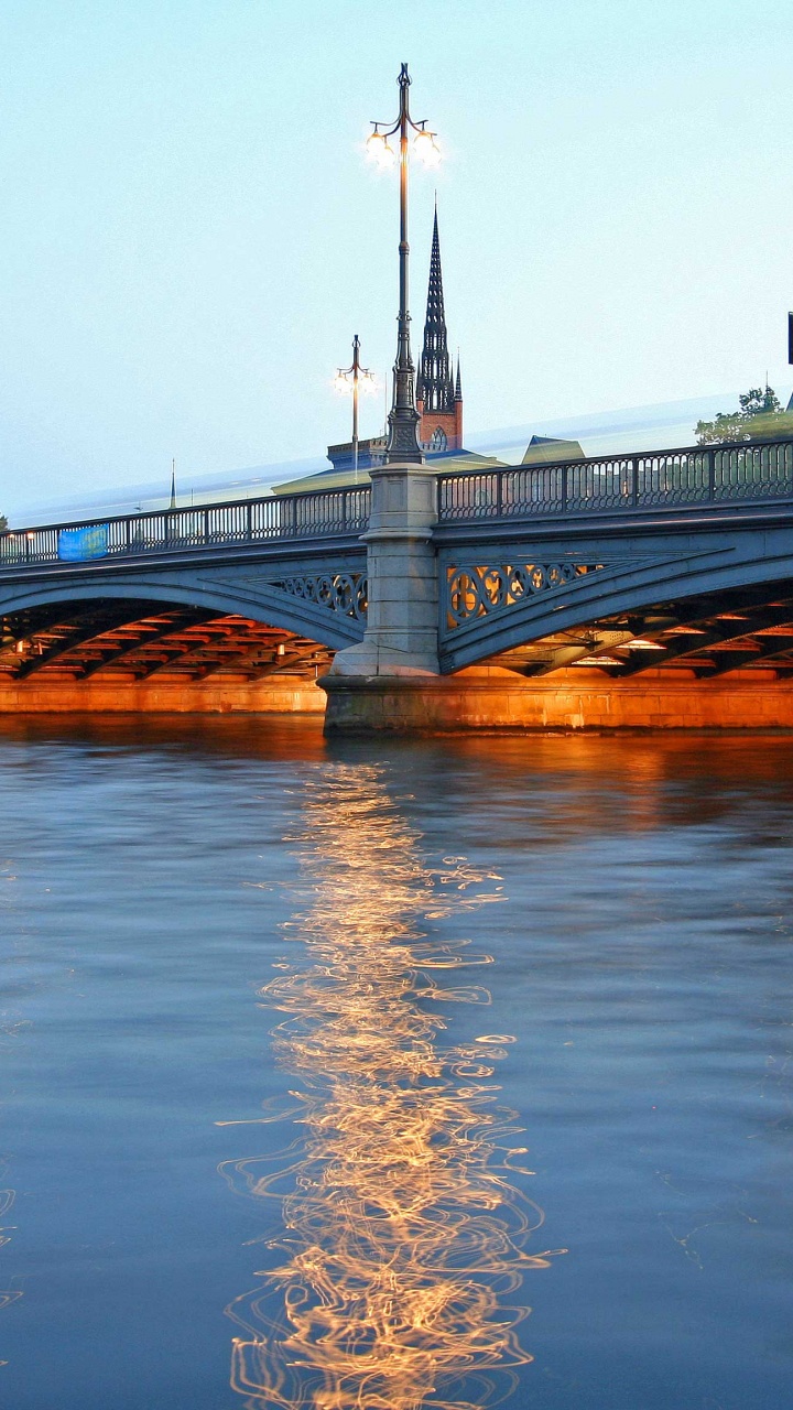 Gray Concrete Bridge Over River During Daytime. Wallpaper in 720x1280 Resolution