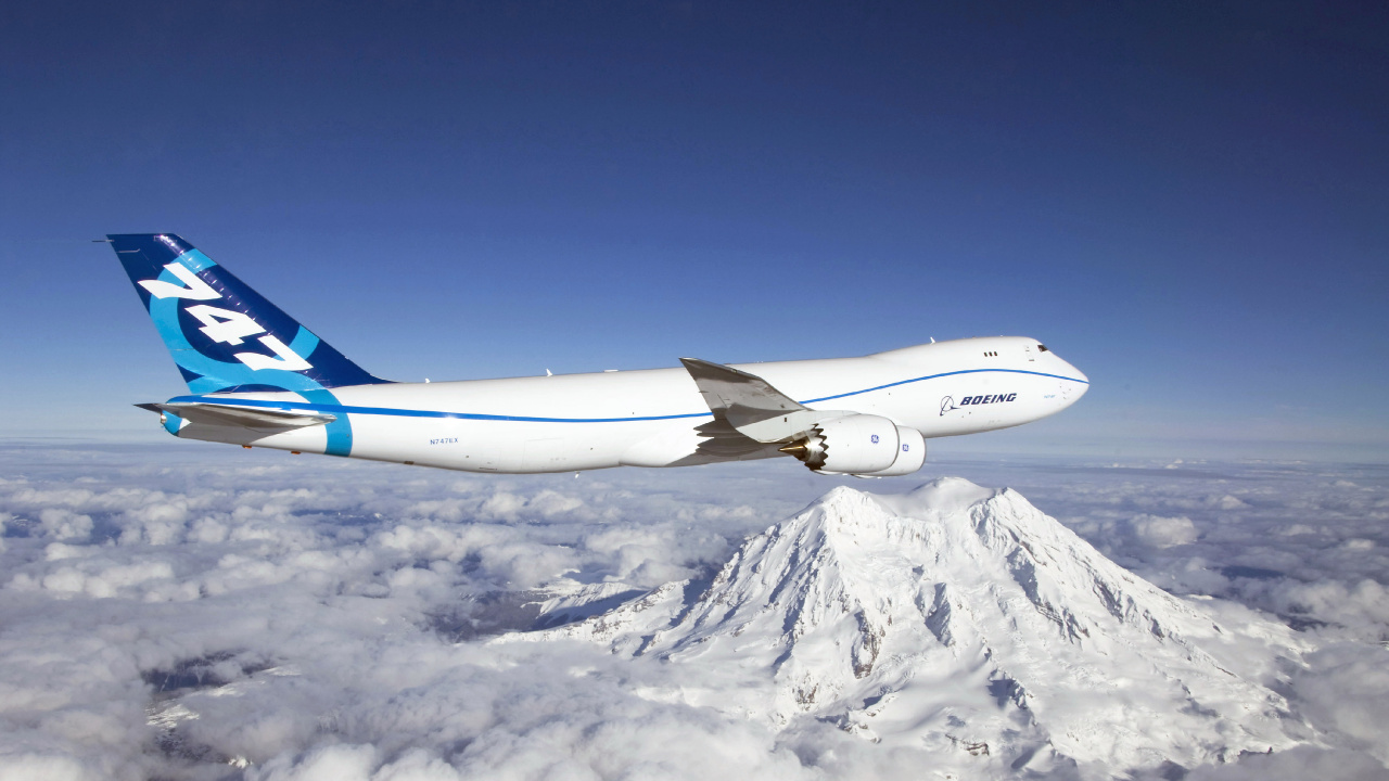 White and Blue Airplane Flying Over Snow Covered Mountain During Daytime. Wallpaper in 1280x720 Resolution