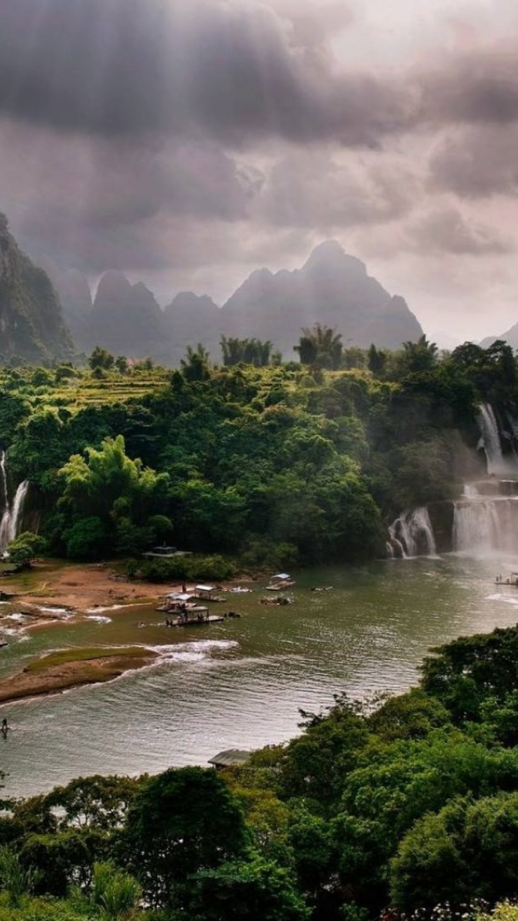 Green Trees Near Water Falls. Wallpaper in 750x1334 Resolution