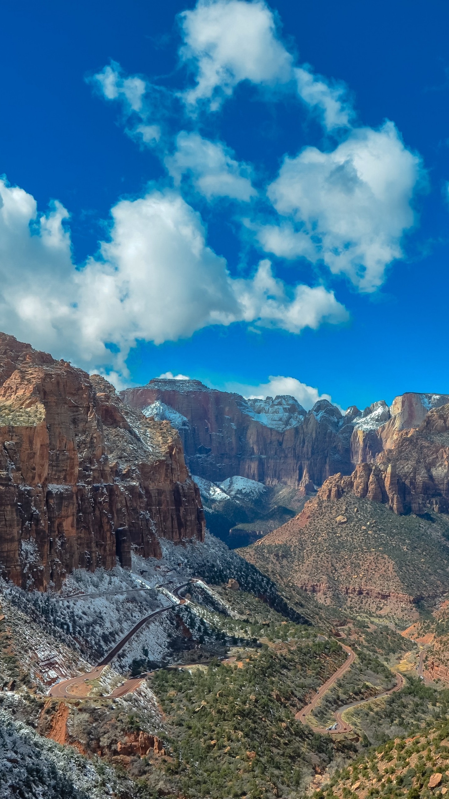 Brown Rocky Mountain Under Blue Sky During Daytime. Wallpaper in 1440x2560 Resolution