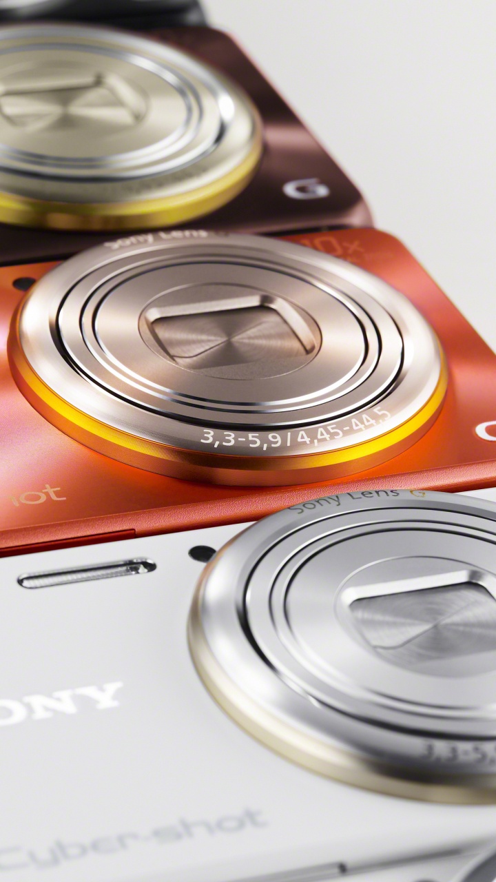Red and Silver Sony Point and Shoot Camera. Wallpaper in 720x1280 Resolution