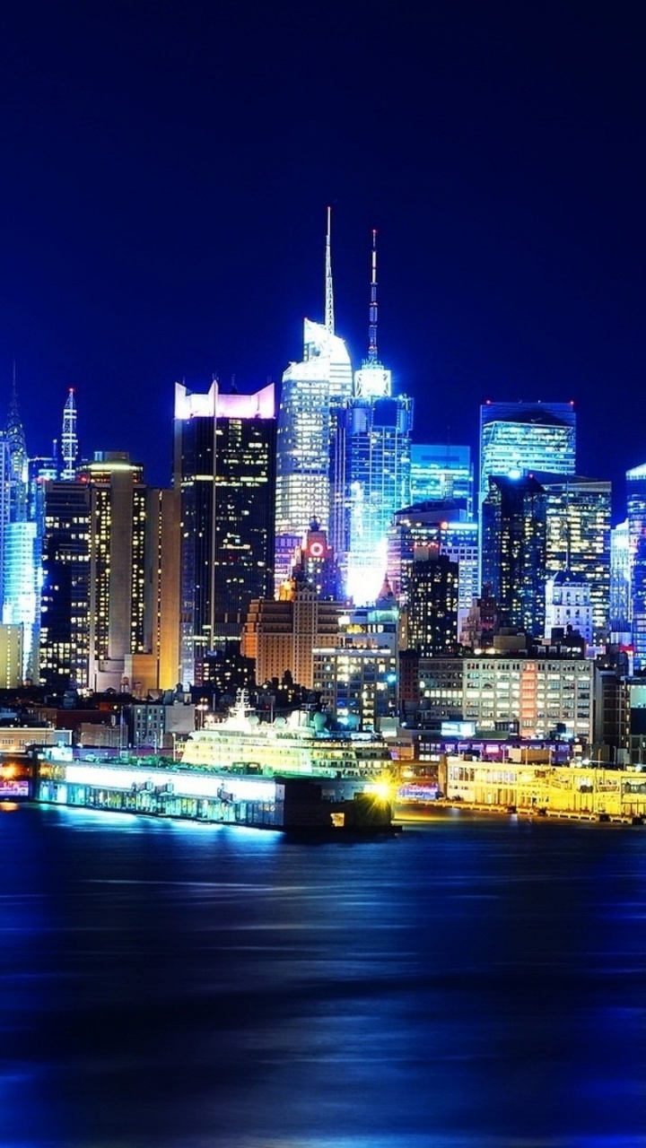 City Skyline During Night Time. Wallpaper in 720x1280 Resolution