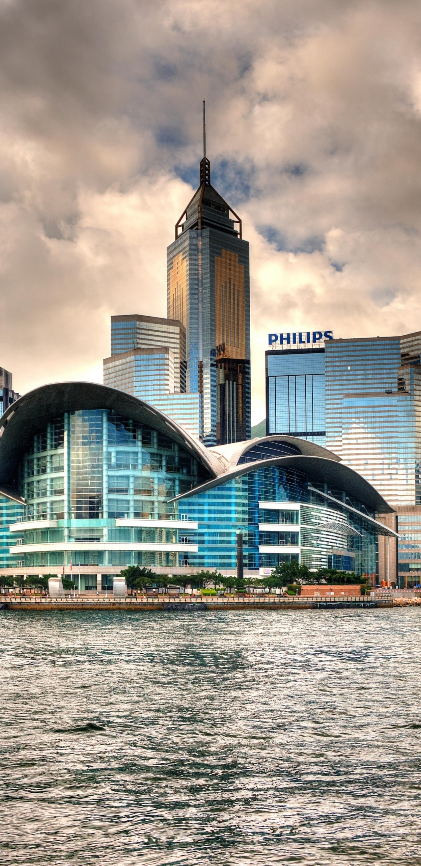 City Skyline Under Cloudy Sky During Daytime. Wallpaper in 1440x2960 Resolution