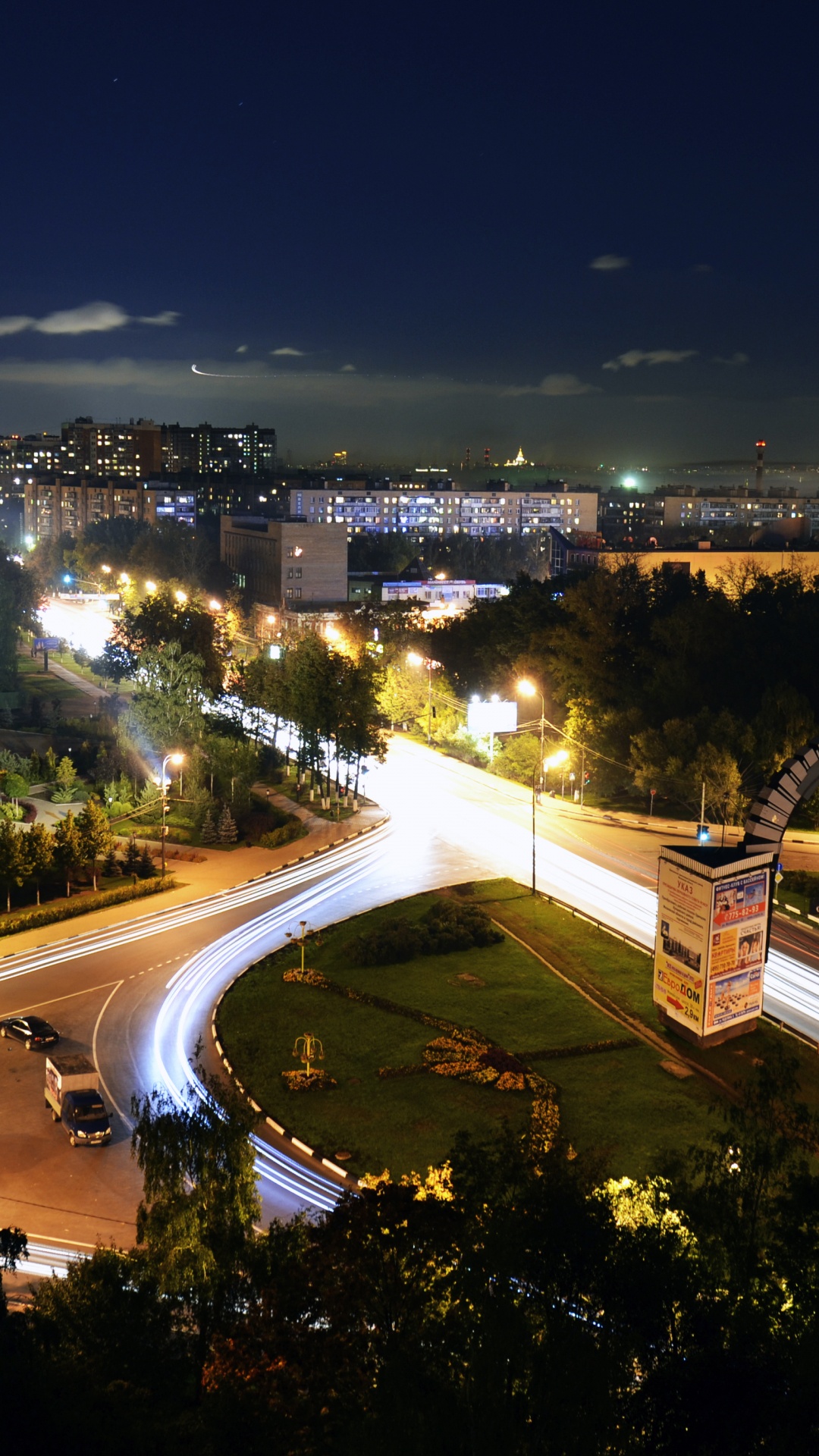 City With High Rise Buildings During Night Time. Wallpaper in 1080x1920 Resolution