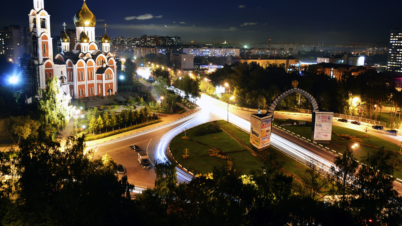 City With High Rise Buildings During Night Time. Wallpaper in 1366x768 Resolution