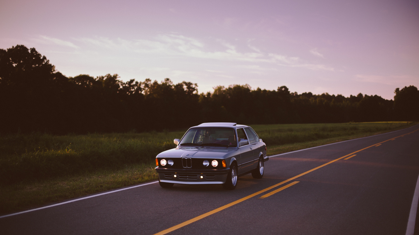 Black Sedan on Road During Daytime. Wallpaper in 1366x768 Resolution