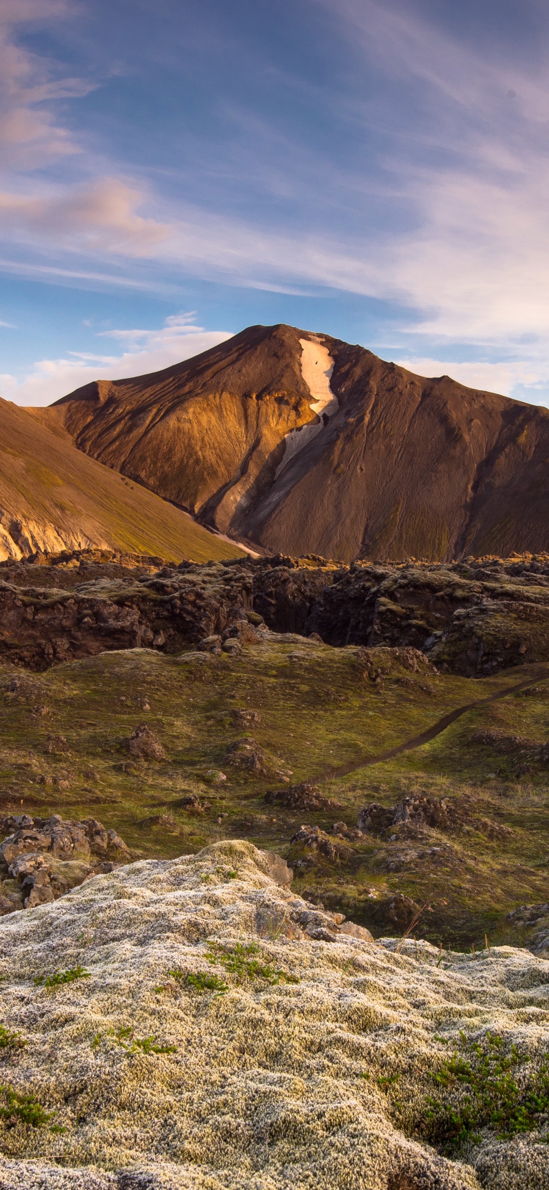 Brown Mountain Under White Clouds During Daytime. Wallpaper in 1125x2436 Resolution