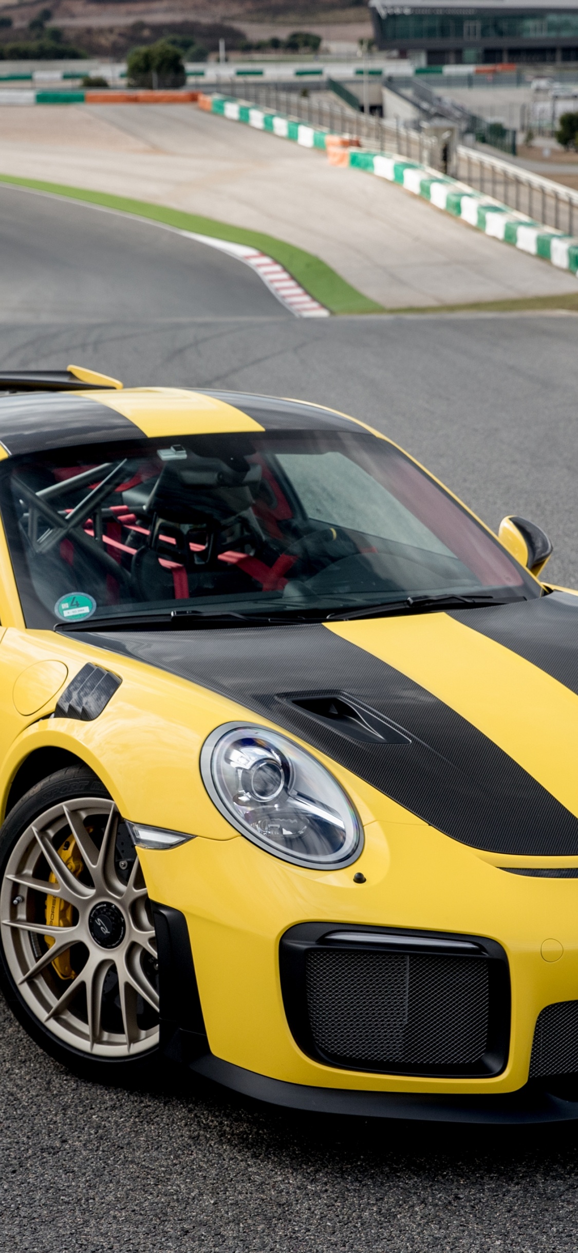Yellow Lamborghini Aventador on Road During Daytime. Wallpaper in 1125x2436 Resolution