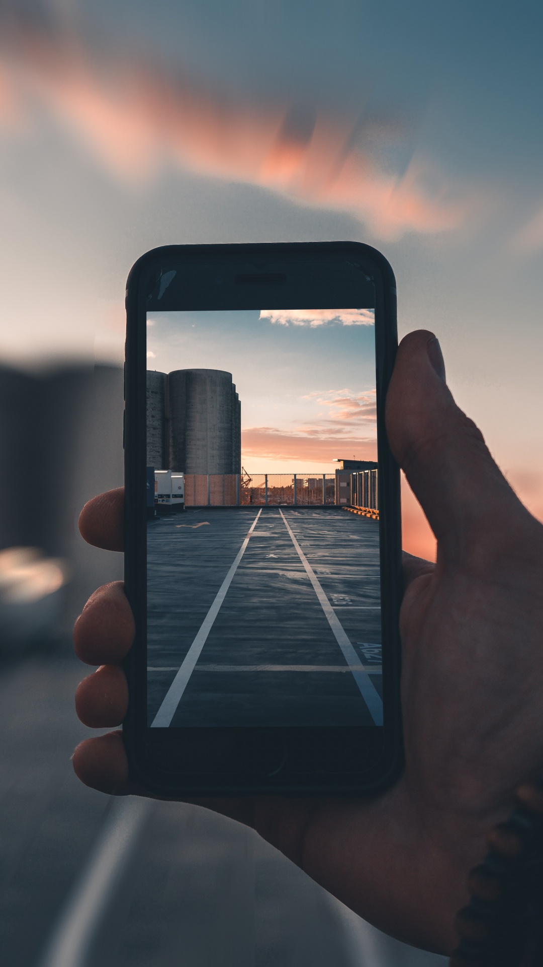 Person Holding Iphone Taking Photo of Sunset. Wallpaper in 1080x1920 Resolution