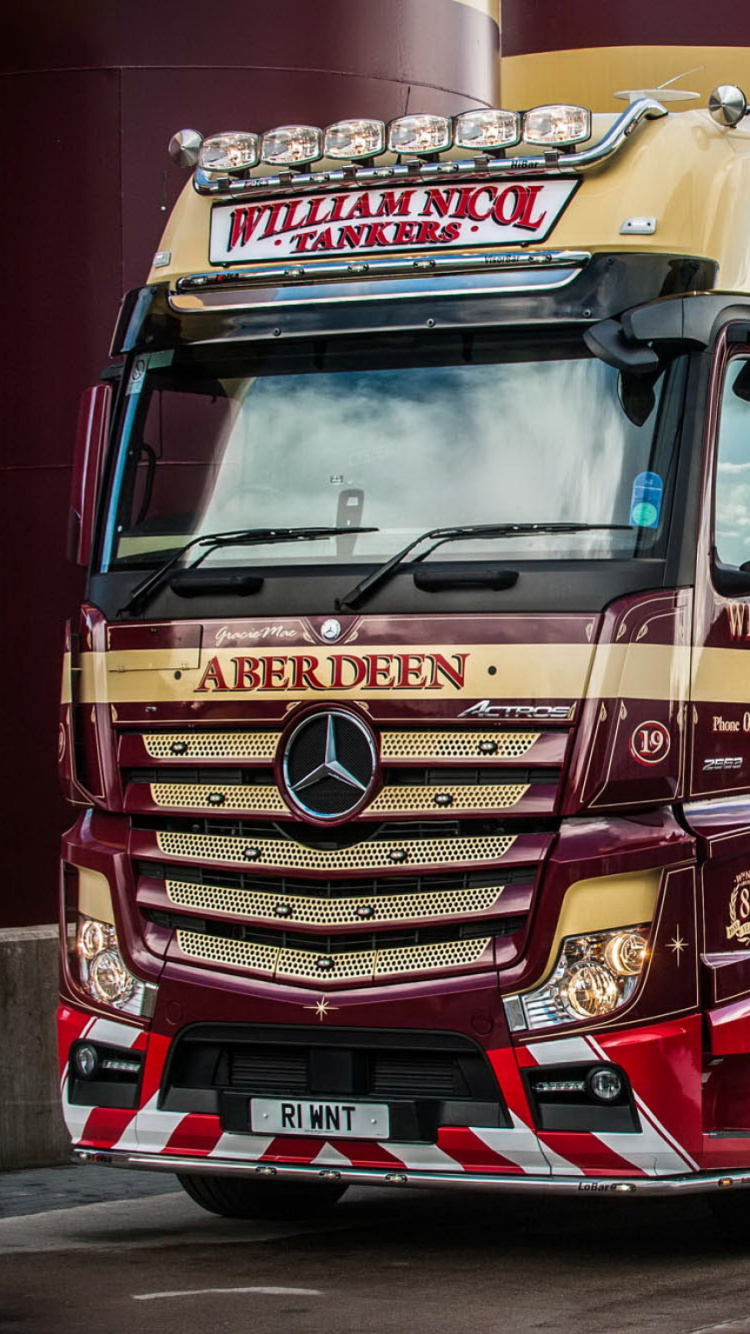 Yellow and Red Truck on Road During Daytime. Wallpaper in 750x1334 Resolution