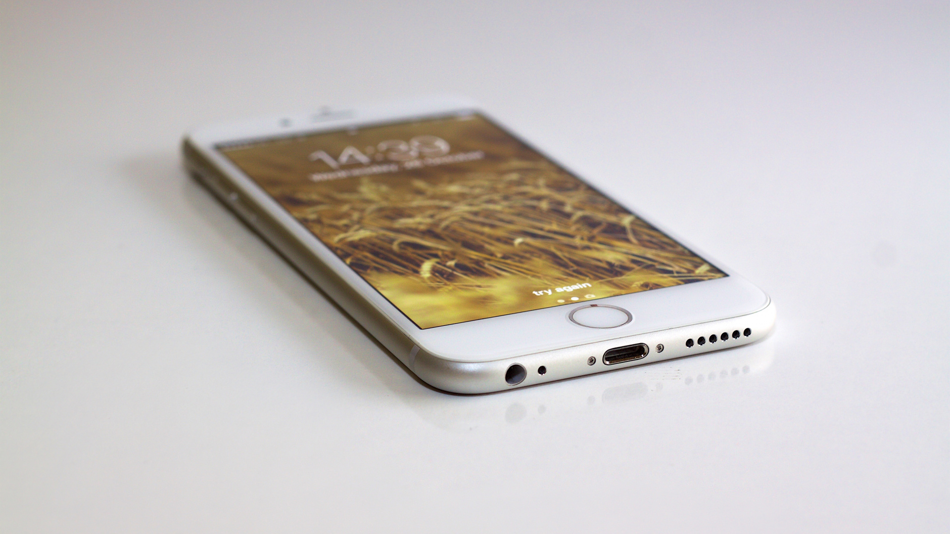 Gold Iphone 6 on White Table. Wallpaper in 1920x1080 Resolution