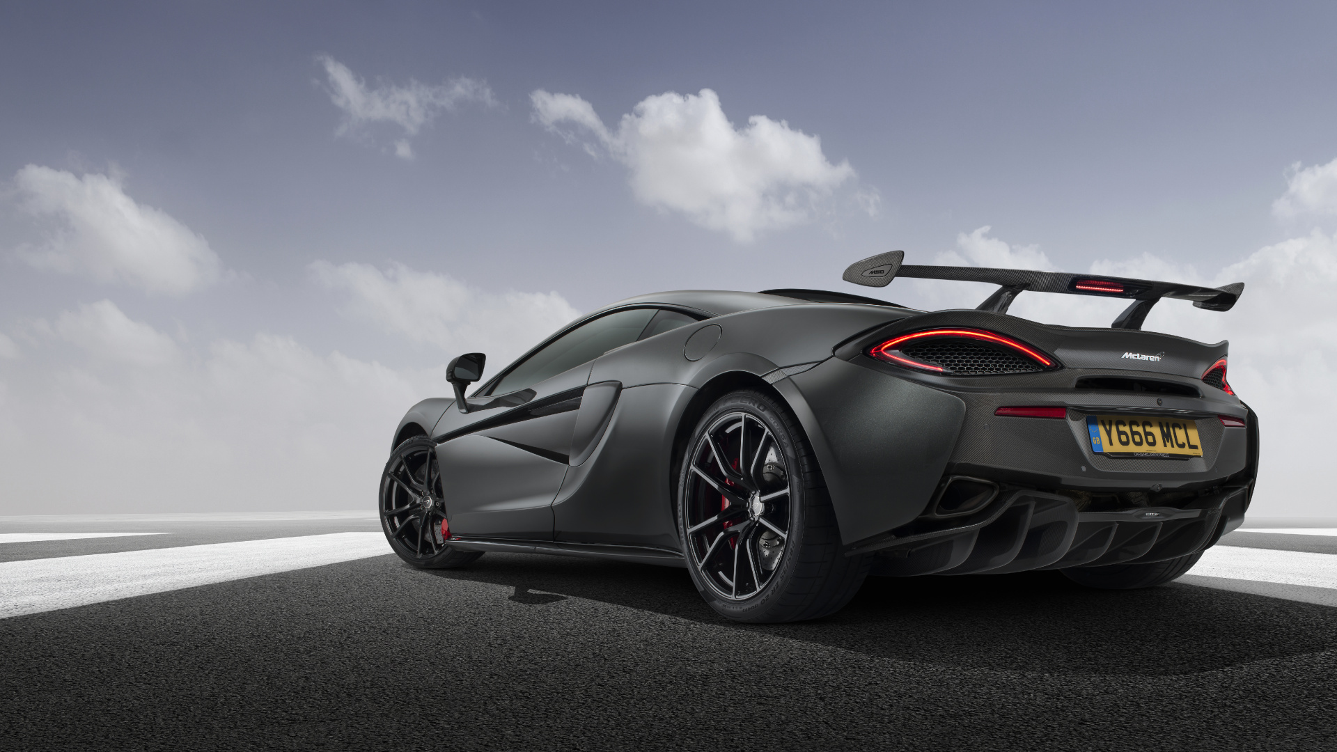 Black Porsche 911 on Road Under Blue Sky During Daytime. Wallpaper in 1920x1080 Resolution