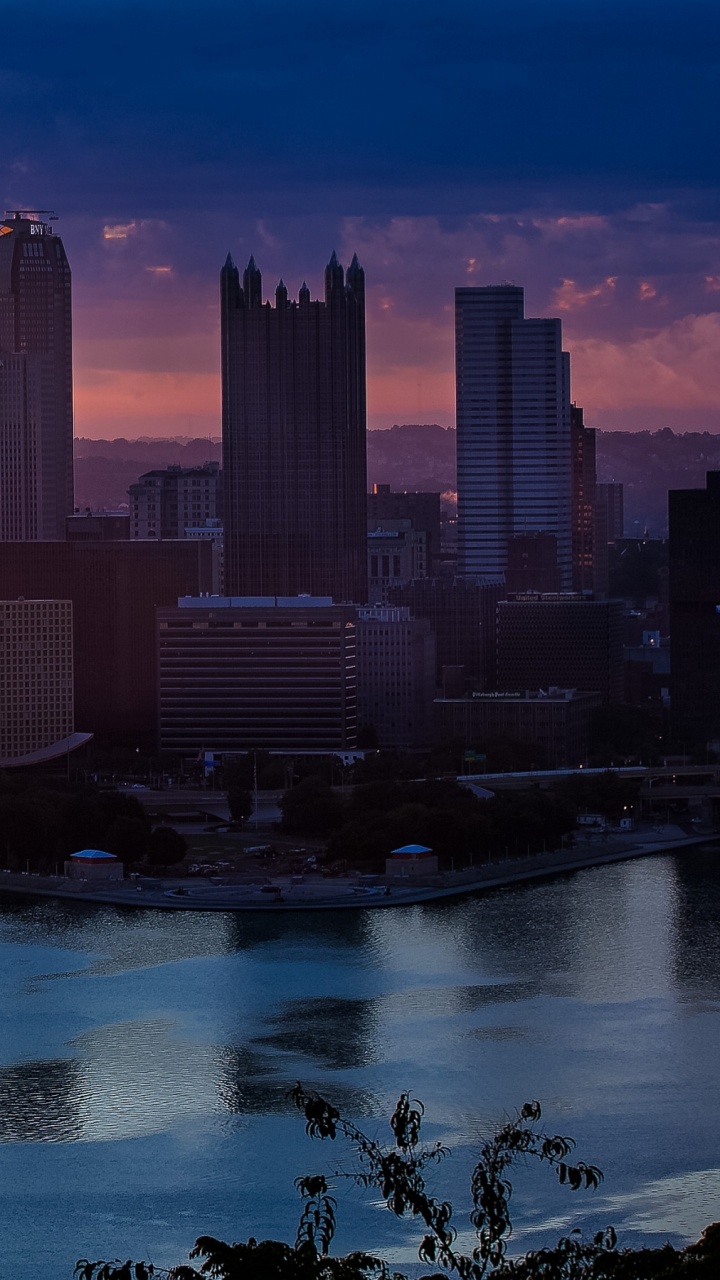High Rise Buildings Near Body of Water During Daytime. Wallpaper in 720x1280 Resolution