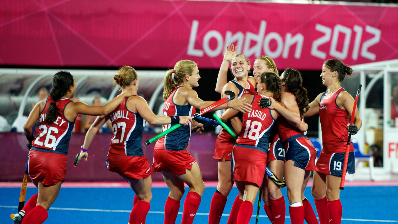 Women in Red and Blue Jersey Shirts. Wallpaper in 1280x720 Resolution