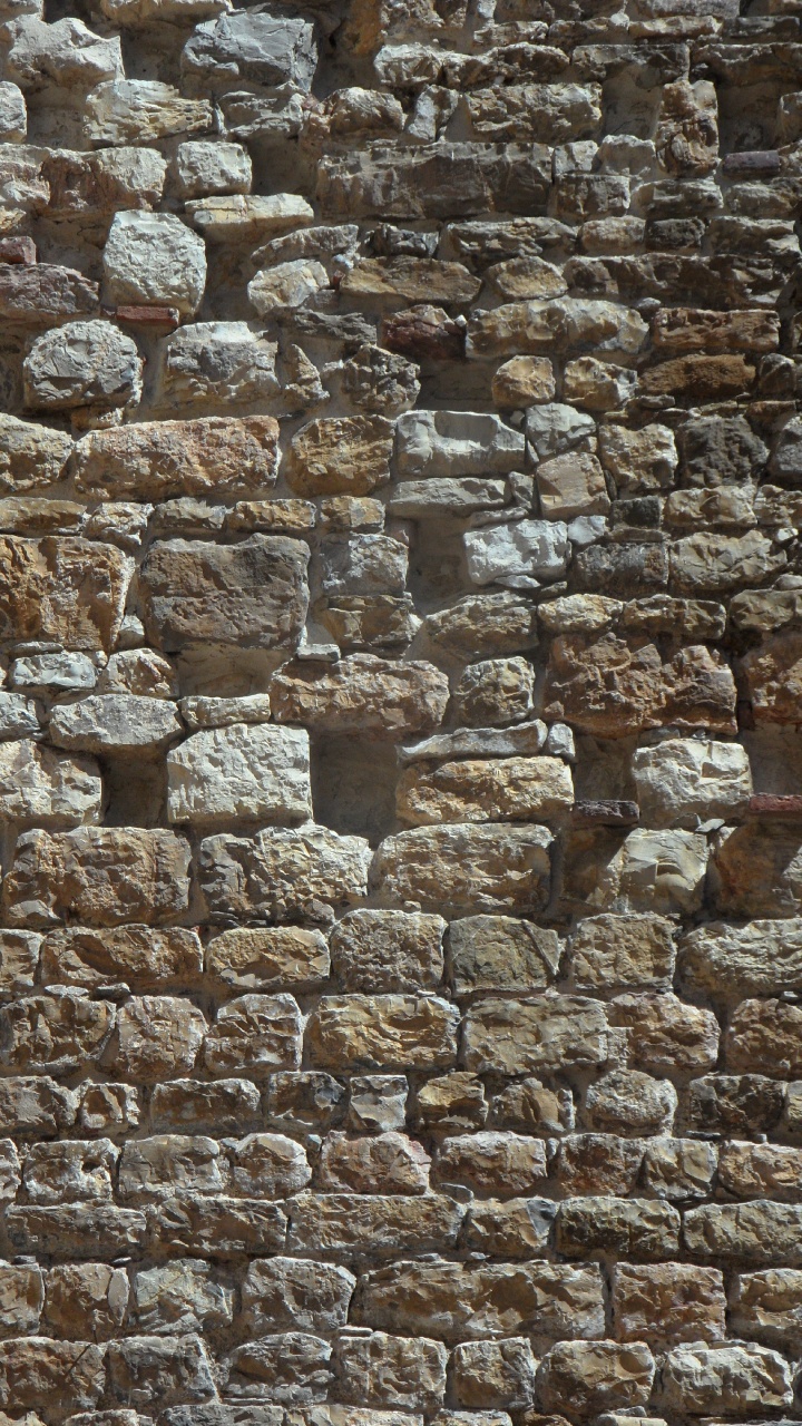 Braune Und Graue Mauer. Wallpaper in 720x1280 Resolution