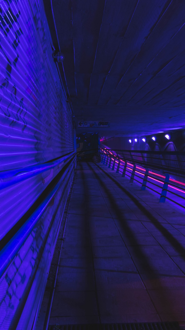 Blue Light on Tunnel During Night Time. Wallpaper in 720x1280 Resolution