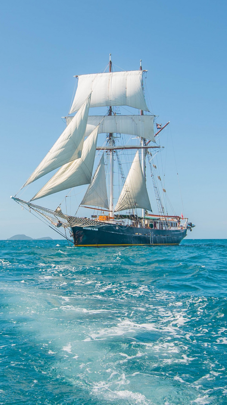 Brown and White Sail Boat on Sea During Daytime. Wallpaper in 750x1334 Resolution