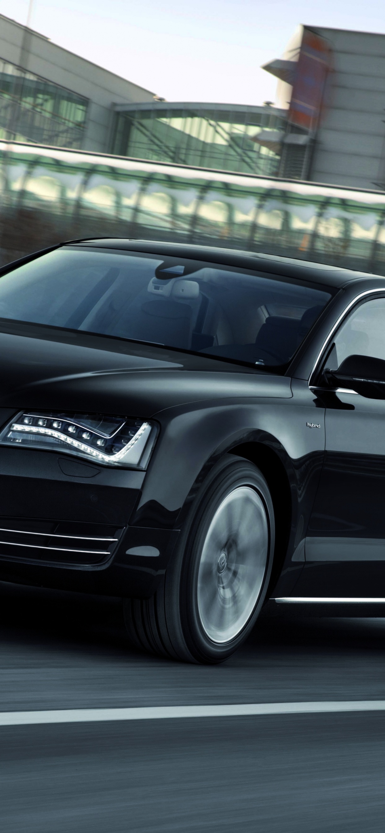 Audi Noire Une Berline 4 Sur Route Pendant la Journée. Wallpaper in 1242x2688 Resolution