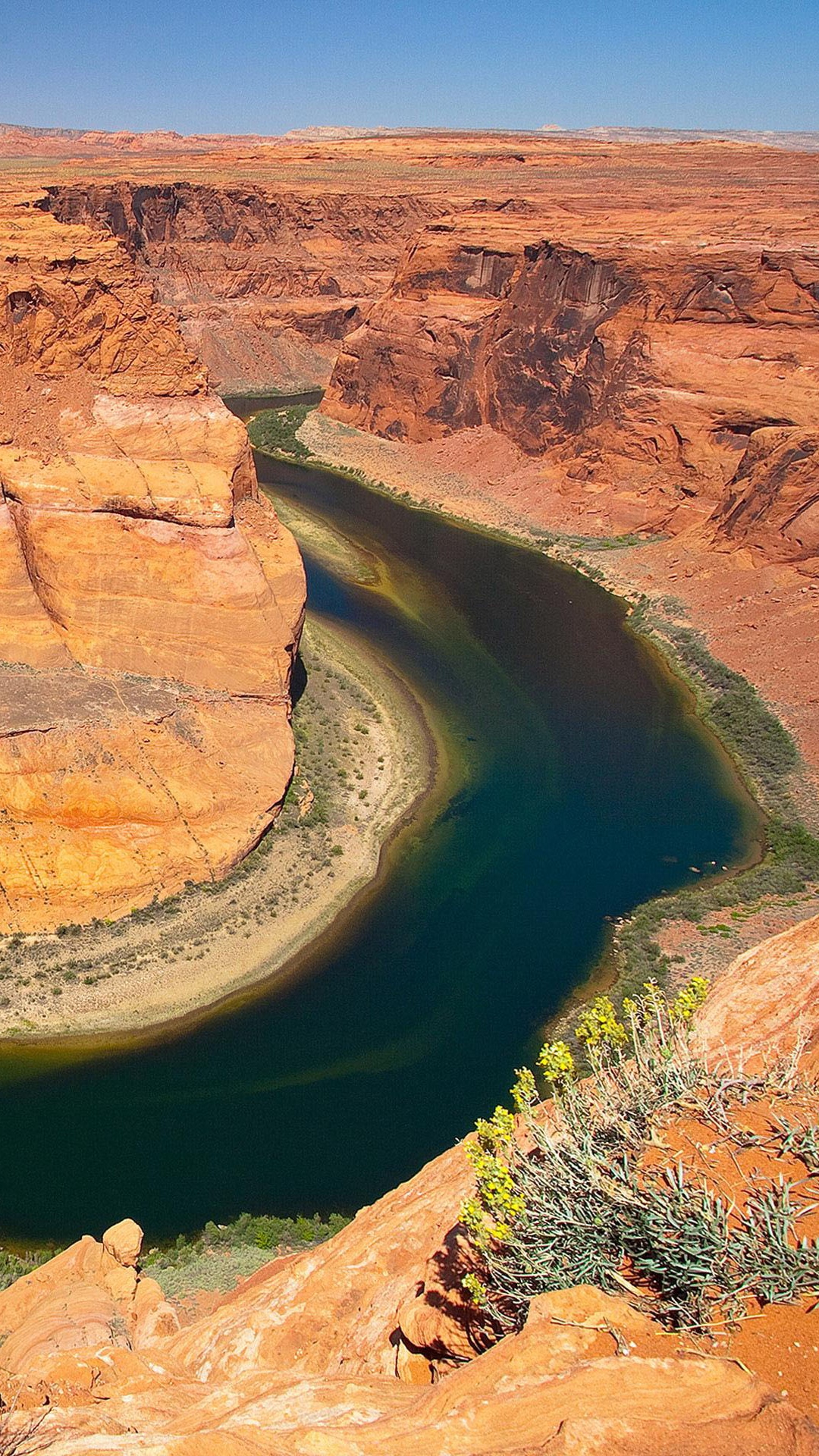Brown Rock Formation Near Green River During Daytime. Wallpaper in 1080x1920 Resolution