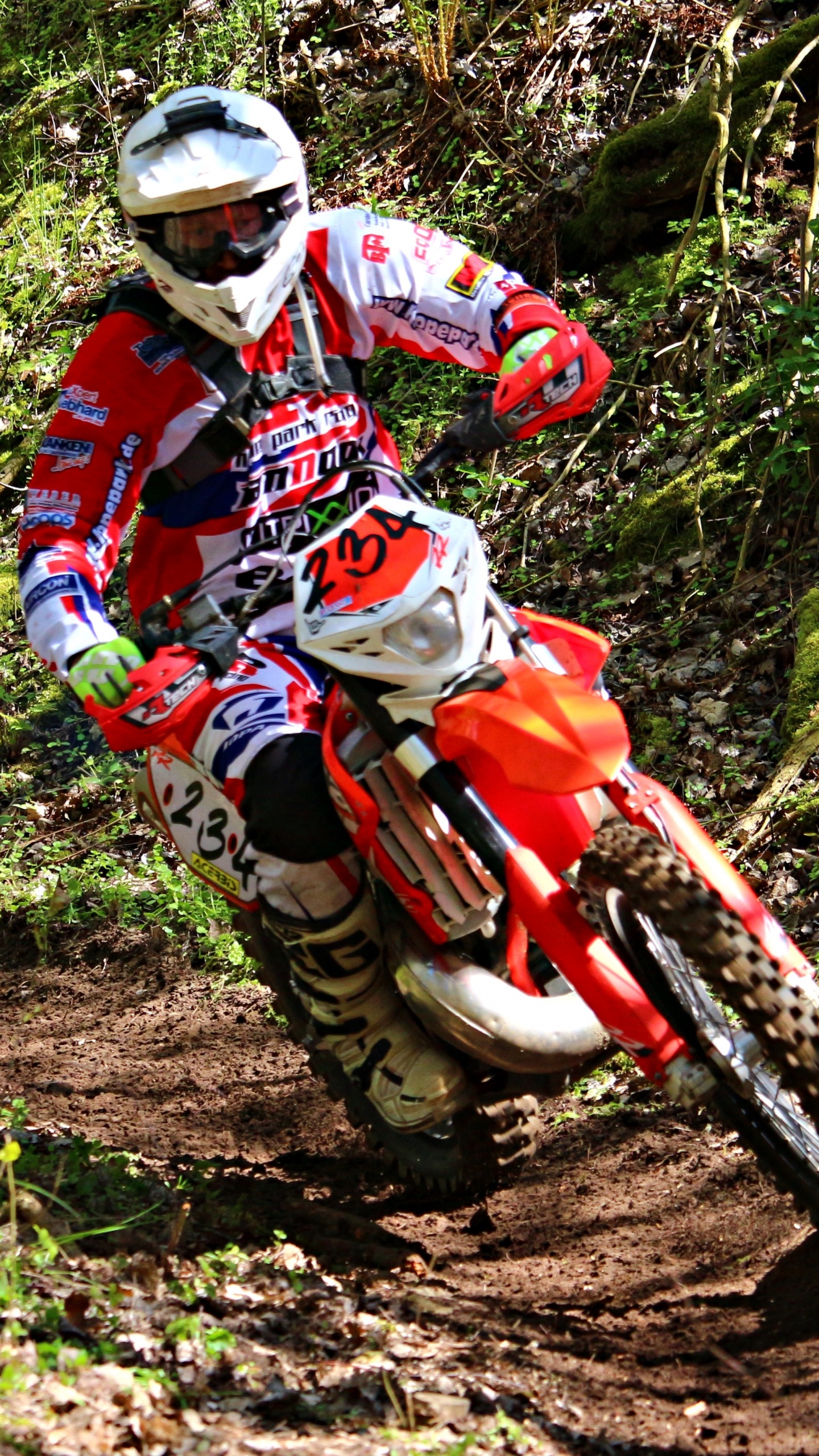 Man in Red and White Motocross Suit Riding Motocross Dirt Bike. Wallpaper in 1440x2560 Resolution