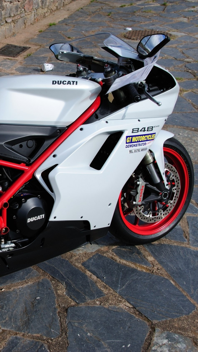 Vélo de Sport Blanc et Rouge. Wallpaper in 750x1334 Resolution