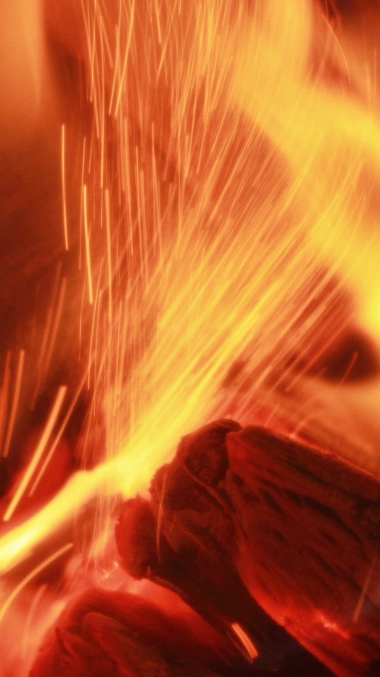 Fuego Rojo y Amarillo en Fotografía de Cerca. Wallpaper in 750x1334 Resolution