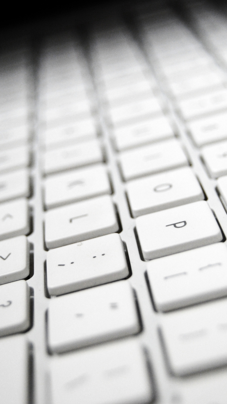 Weiße Und Schwarze Computertastatur. Wallpaper in 750x1334 Resolution