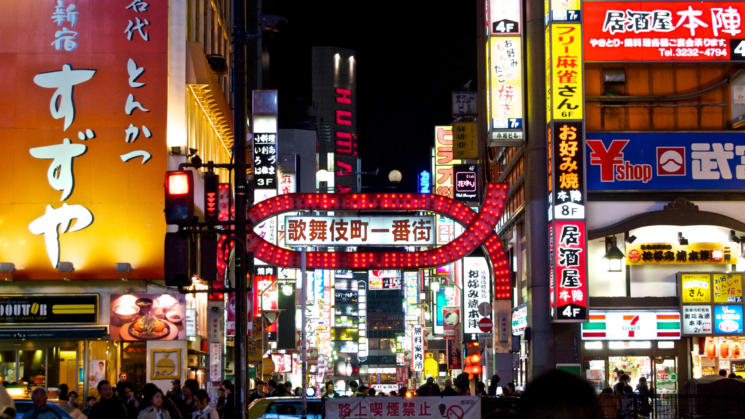 People Walking on Street During Nighttime. Wallpaper in 2560x1440 Resolution