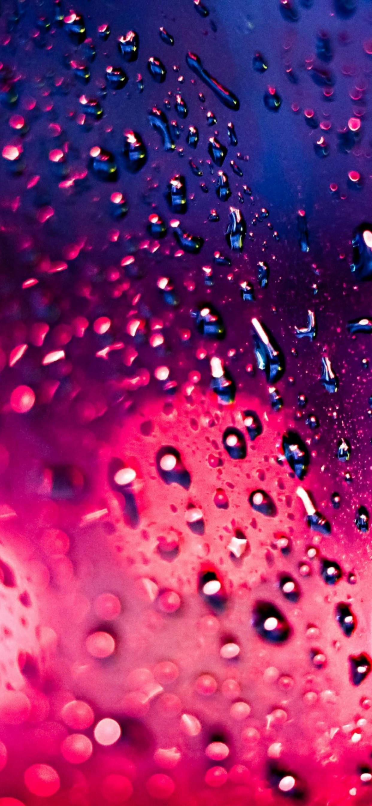 Pink and Blue Water Droplets. Wallpaper in 1242x2688 Resolution