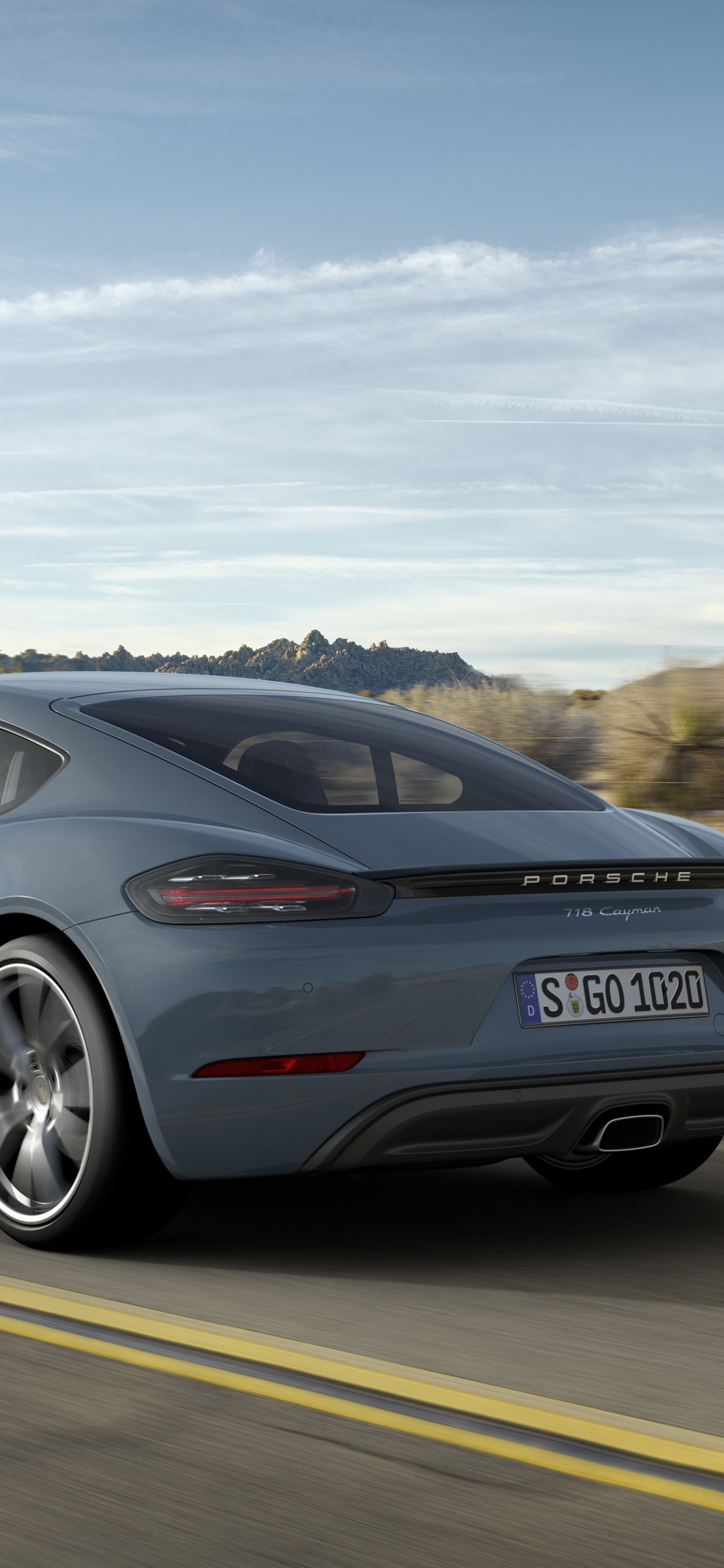 Black Audi r 8 on Road During Daytime. Wallpaper in 1125x2436 Resolution