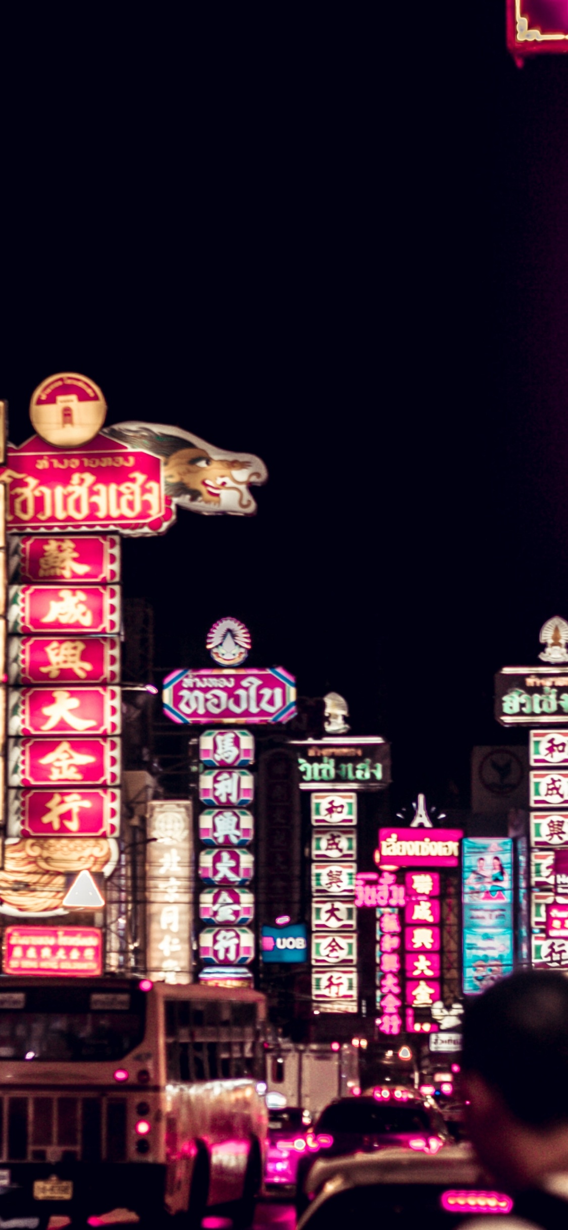 People Walking on Street During Nighttime. Wallpaper in 1125x2436 Resolution