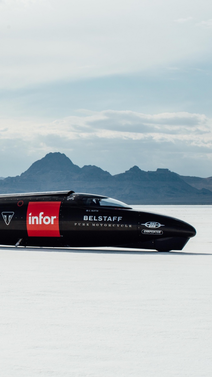 Red and Black Jet Plane on Snow Covered Ground During Daytime. Wallpaper in 720x1280 Resolution