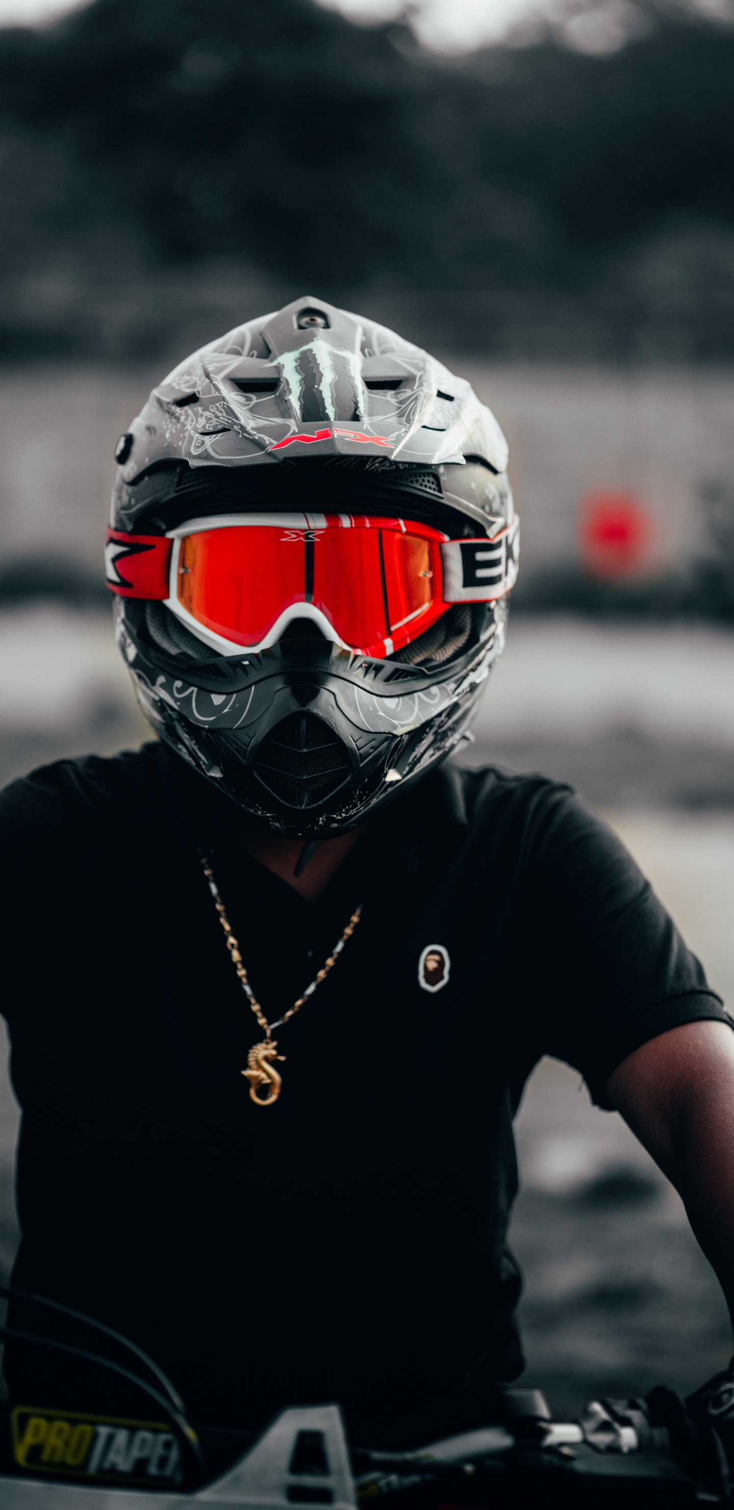 Person Wearing Black and Red Helmet. Wallpaper in 1440x2960 Resolution